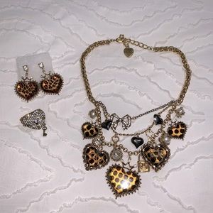 Betsey Johnson necklace, earrings, and ring